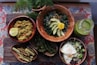 assorted foods on bowls