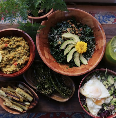 assorted foods on bowls