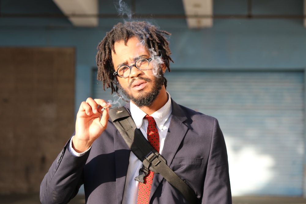 man smoking cigarette