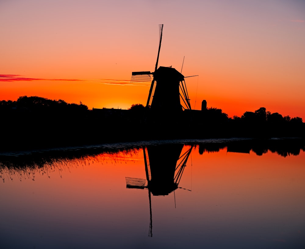 silhouette of water mill
