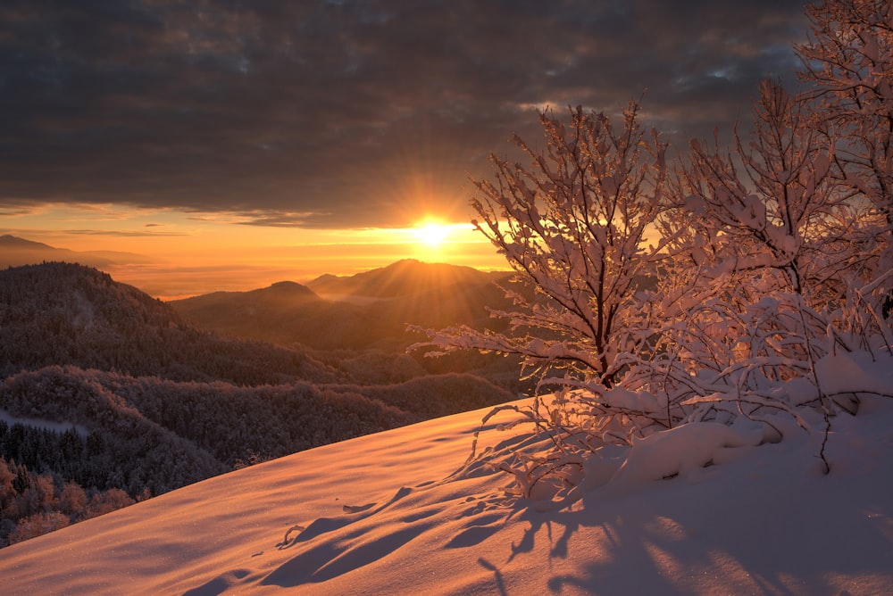 silhouette of mountain under cloudy sky