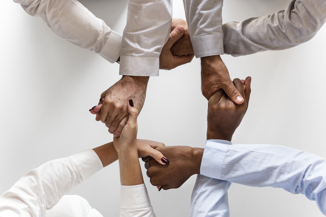 group of people hand gesture