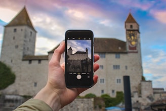 A smartphone displaying the Castillos de España app with castle maps