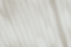 a close up view of a white fabric