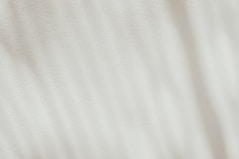 a close up view of a white fabric