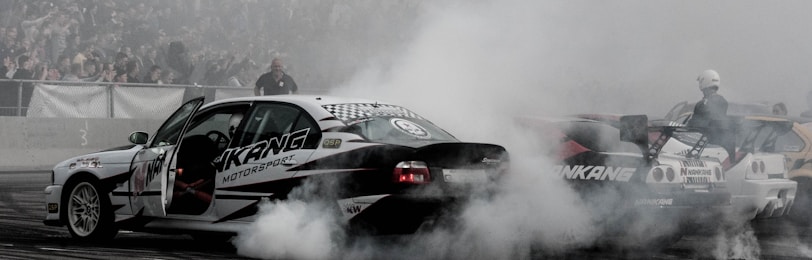 A vibrant stock car racing scene capturing the excitement of the Alabama Gang.