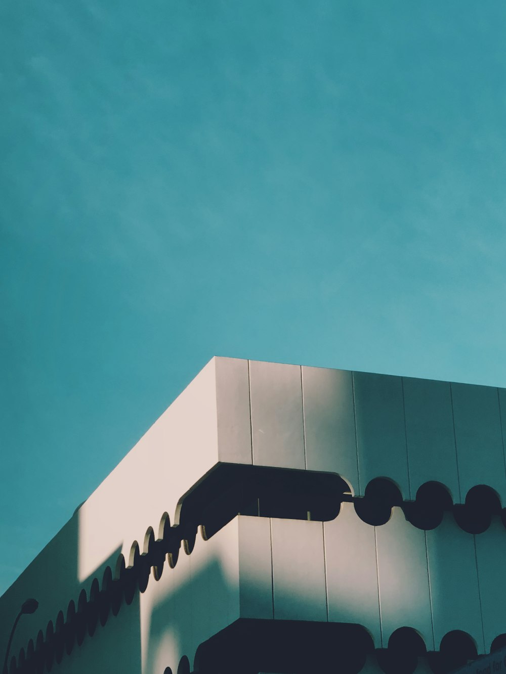 low-angle photography of building under blue sky during daytime