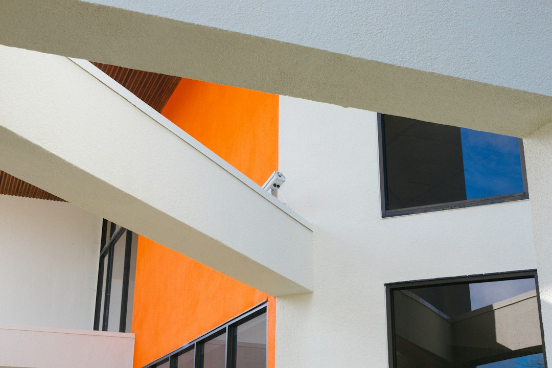 orange and white concrete building,