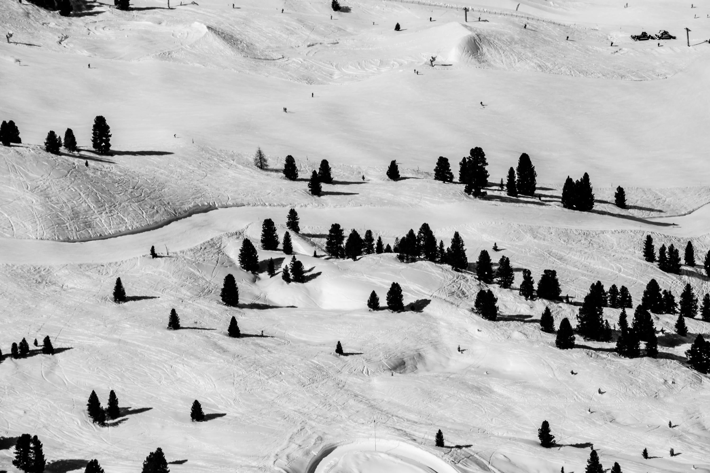 aerial photo of mountain covered in snow above teams background