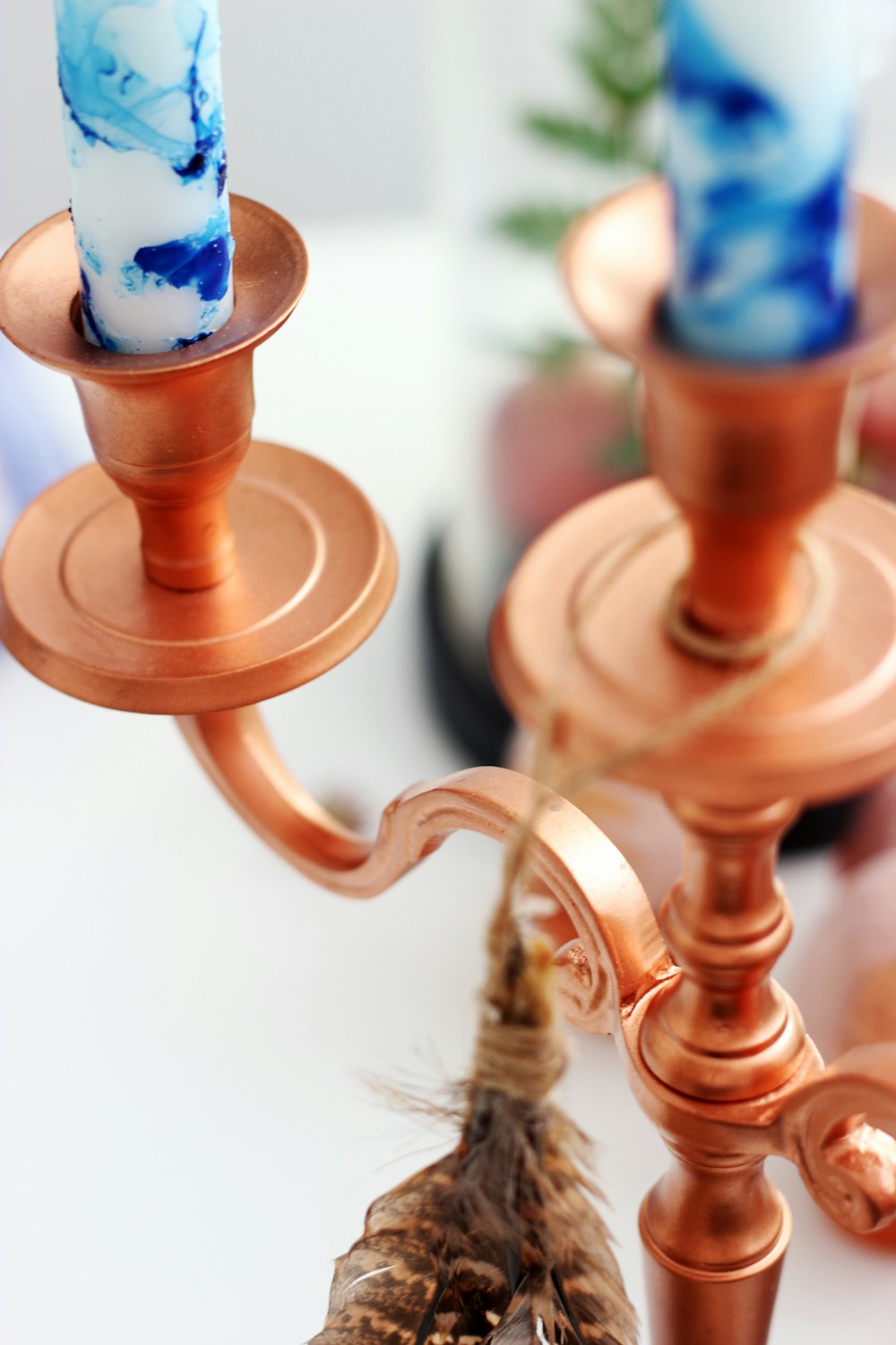 closeup photo of brass-colored candelabra