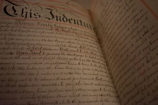 Chris Indenture text on book