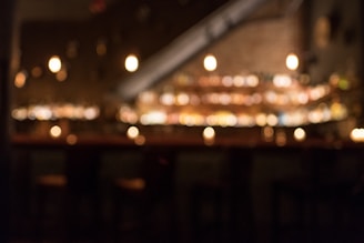 A warm, inviting image of a cozy lounge with soft lighting, suggesting a discreet and comfortable atmosphere.