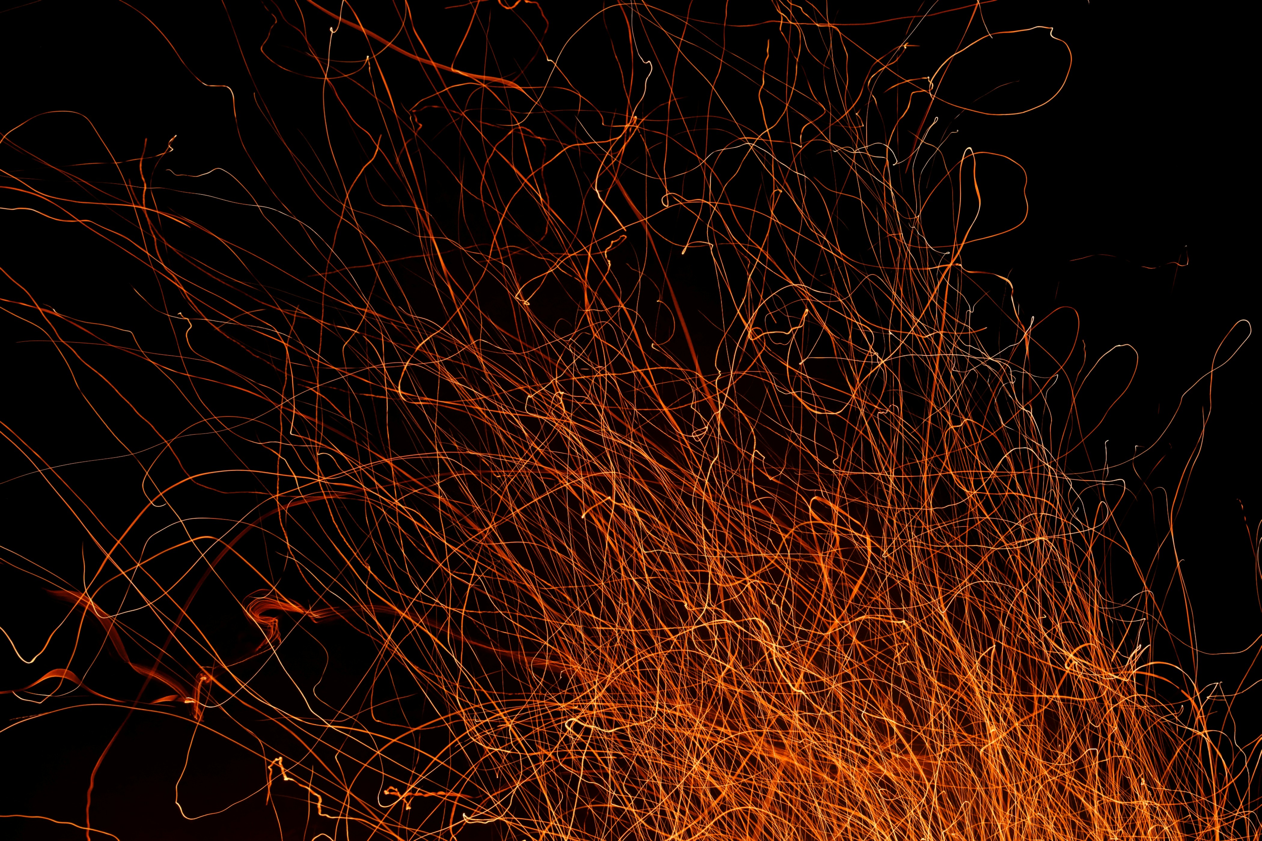 Fire - one of the most fascinating things in the world. Here’s a long exposure shot of some sparks dancing in the night.