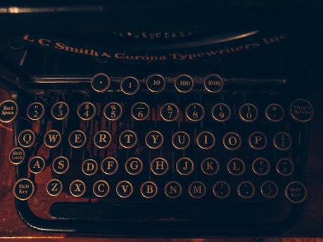 black and brown typewriter