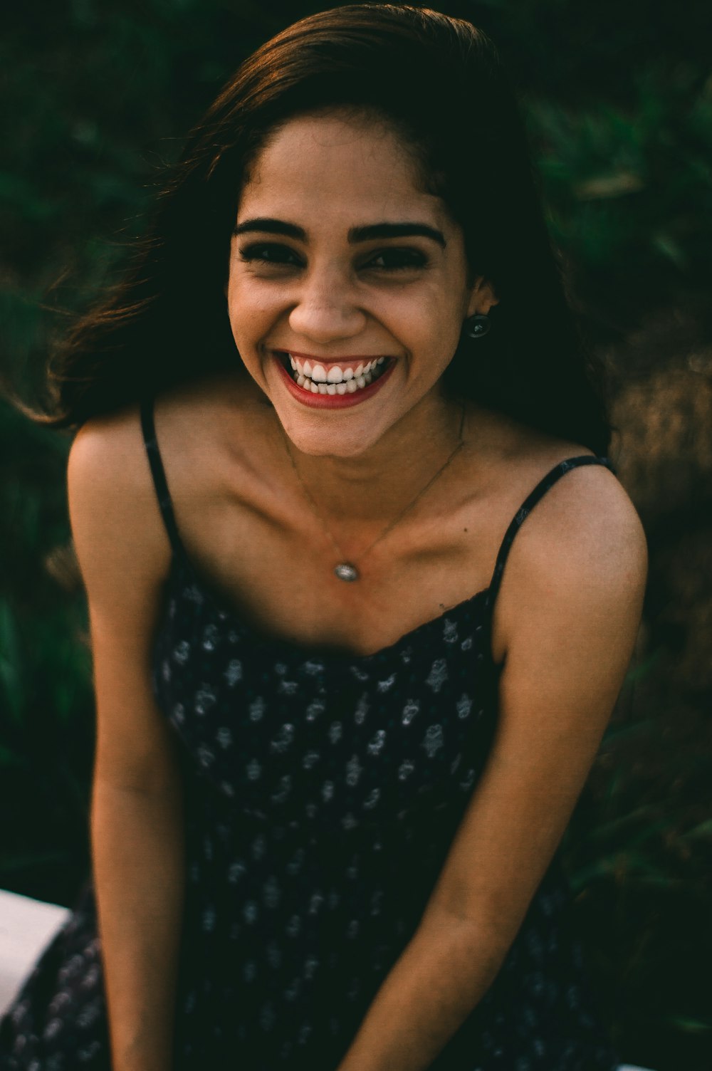 woman sitting and smiling