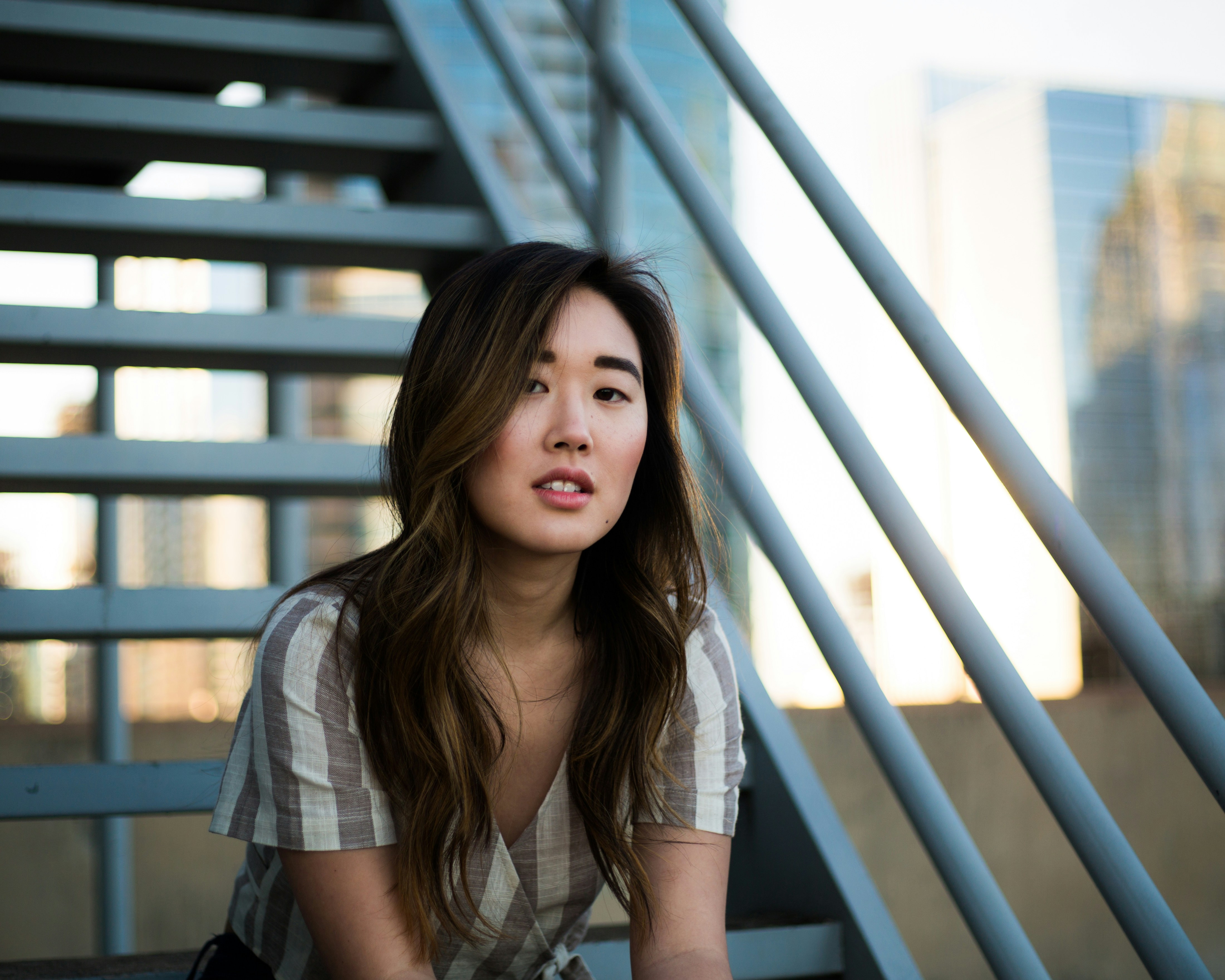 great photo recipe,how to photograph shot in downtown austin, tx with model gaby yu.; woman sitting on white metal stairs