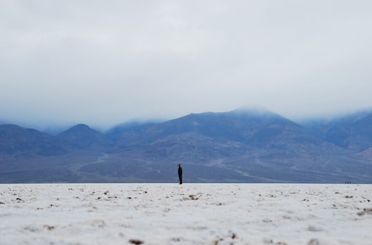 photo of person standing on white field in Death Valley United States