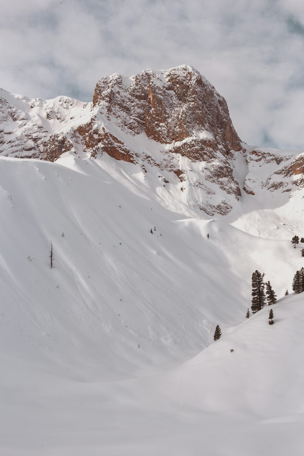 photo of mountains filled with snow