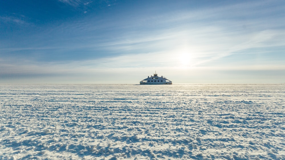 white ship on body of water