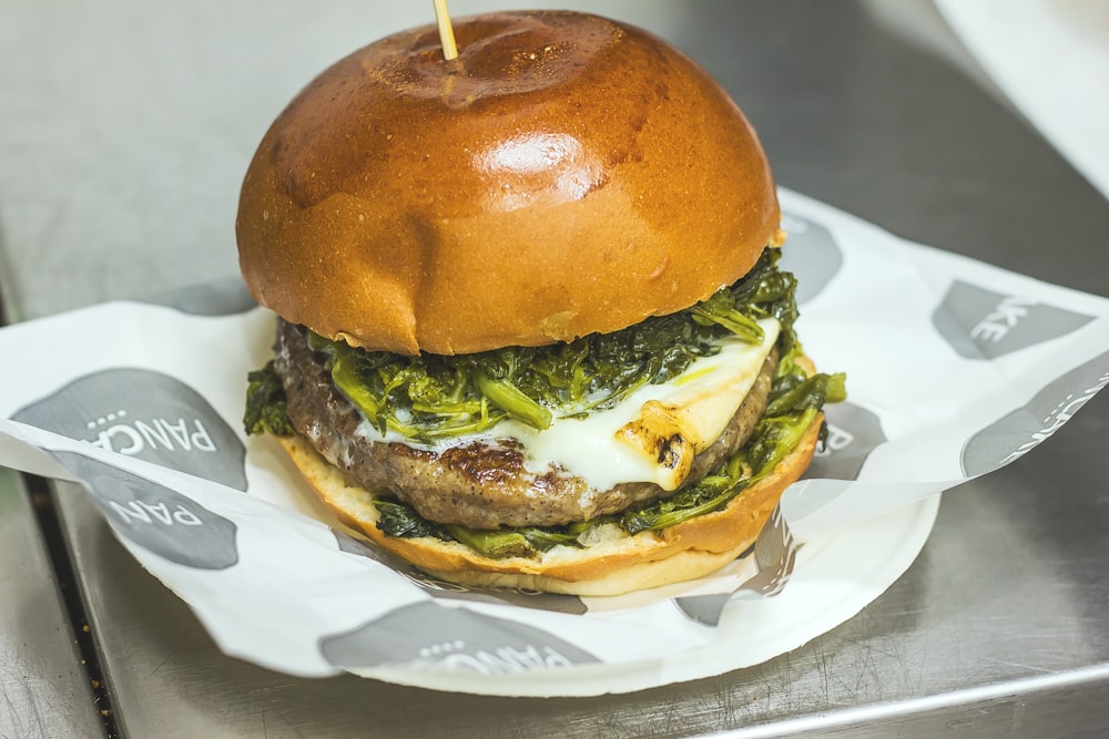 hamburger with vegetables on plate