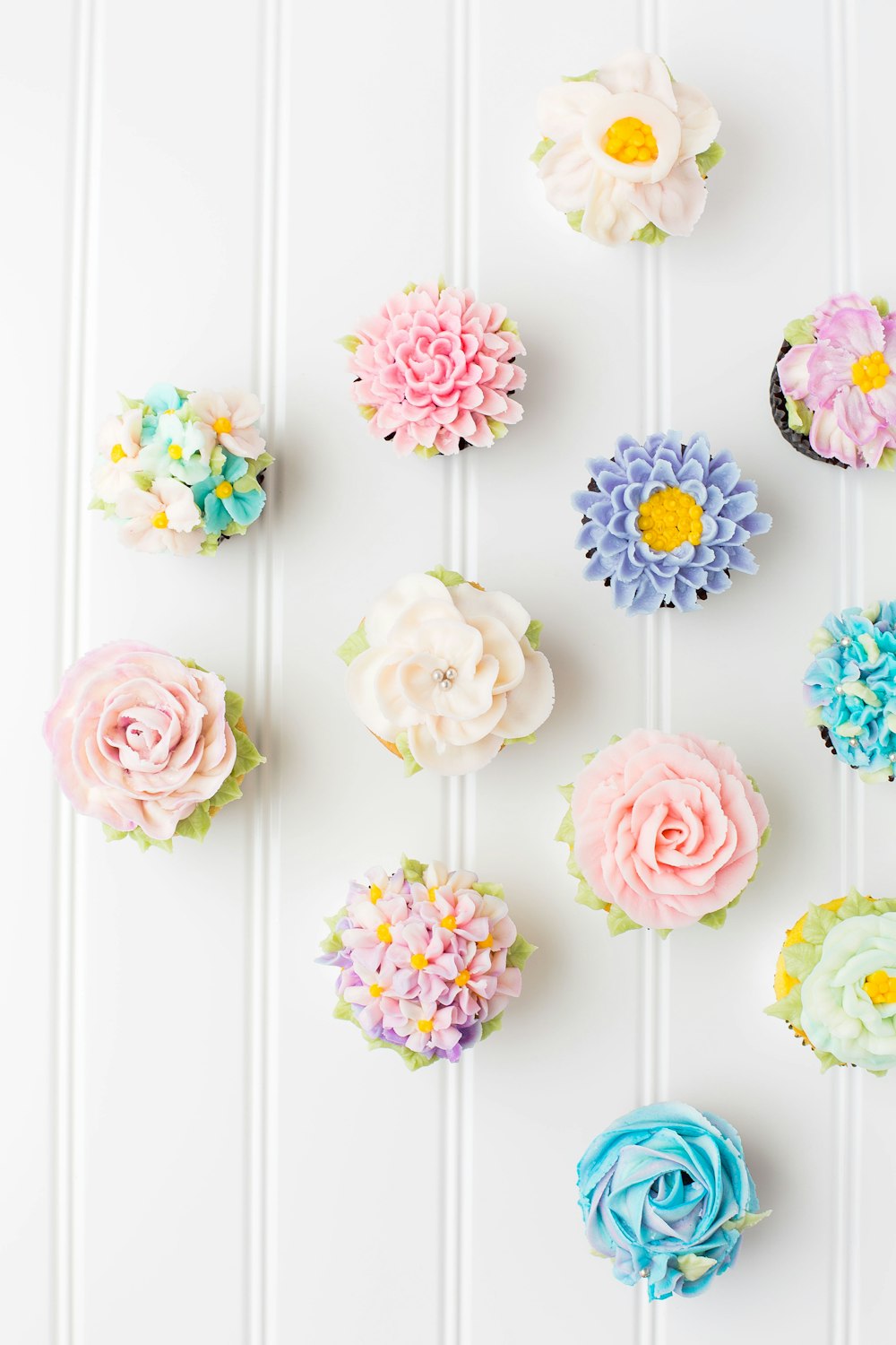 flower cupcakes on white surface