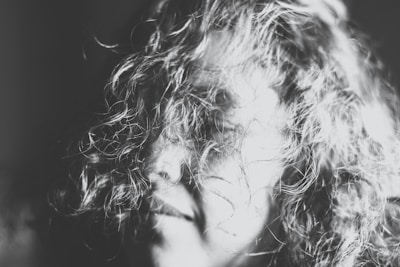 A close-up of beautifully styled hair showcasing intricate details.