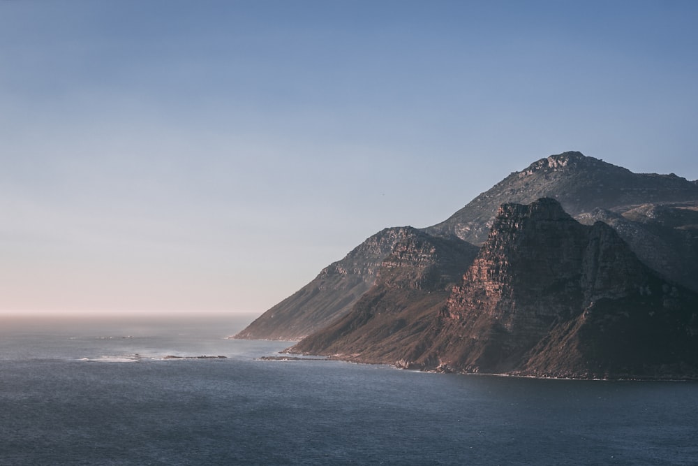 scenery of body of water near mountain