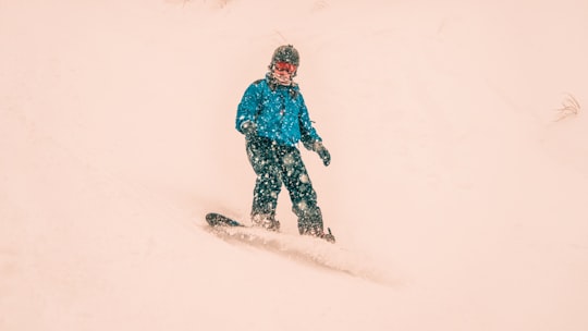 person using snowboard in Hakuba Japan