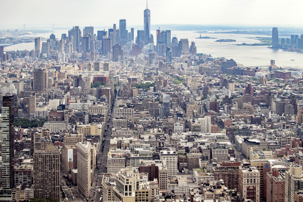 aerial photography of high-rise buildings near body of water at daytime