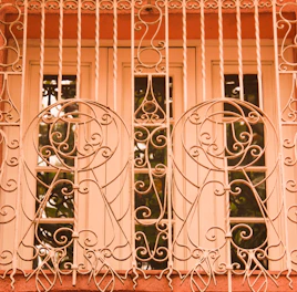 A sleek invisible grill on a window blending seamlessly with the frame.