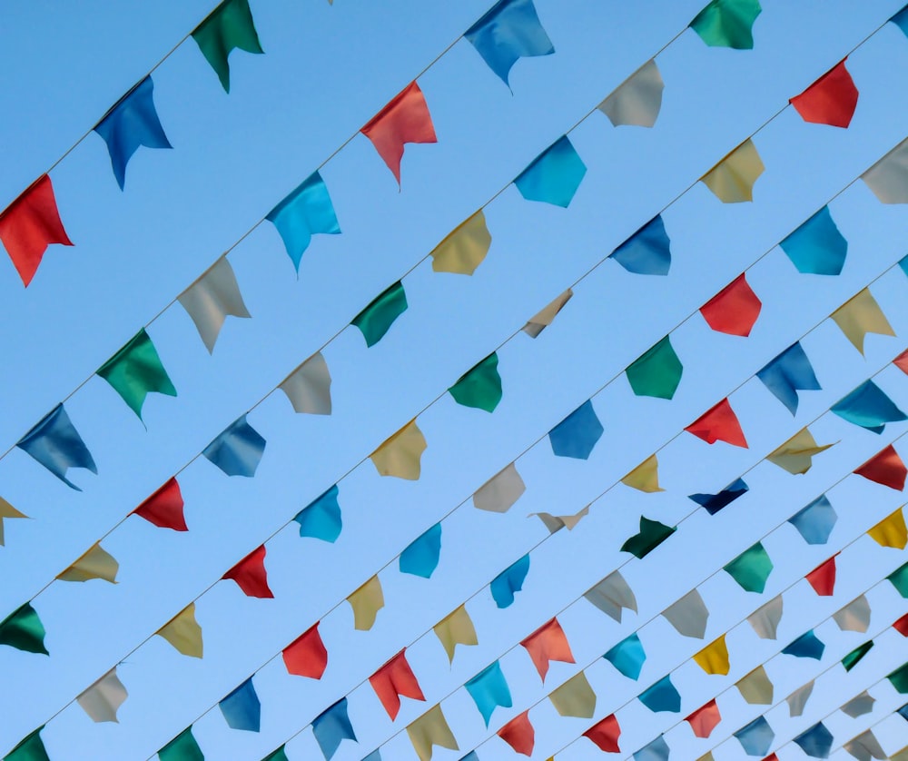 low-angle photography of assorted-color pennant banner lot