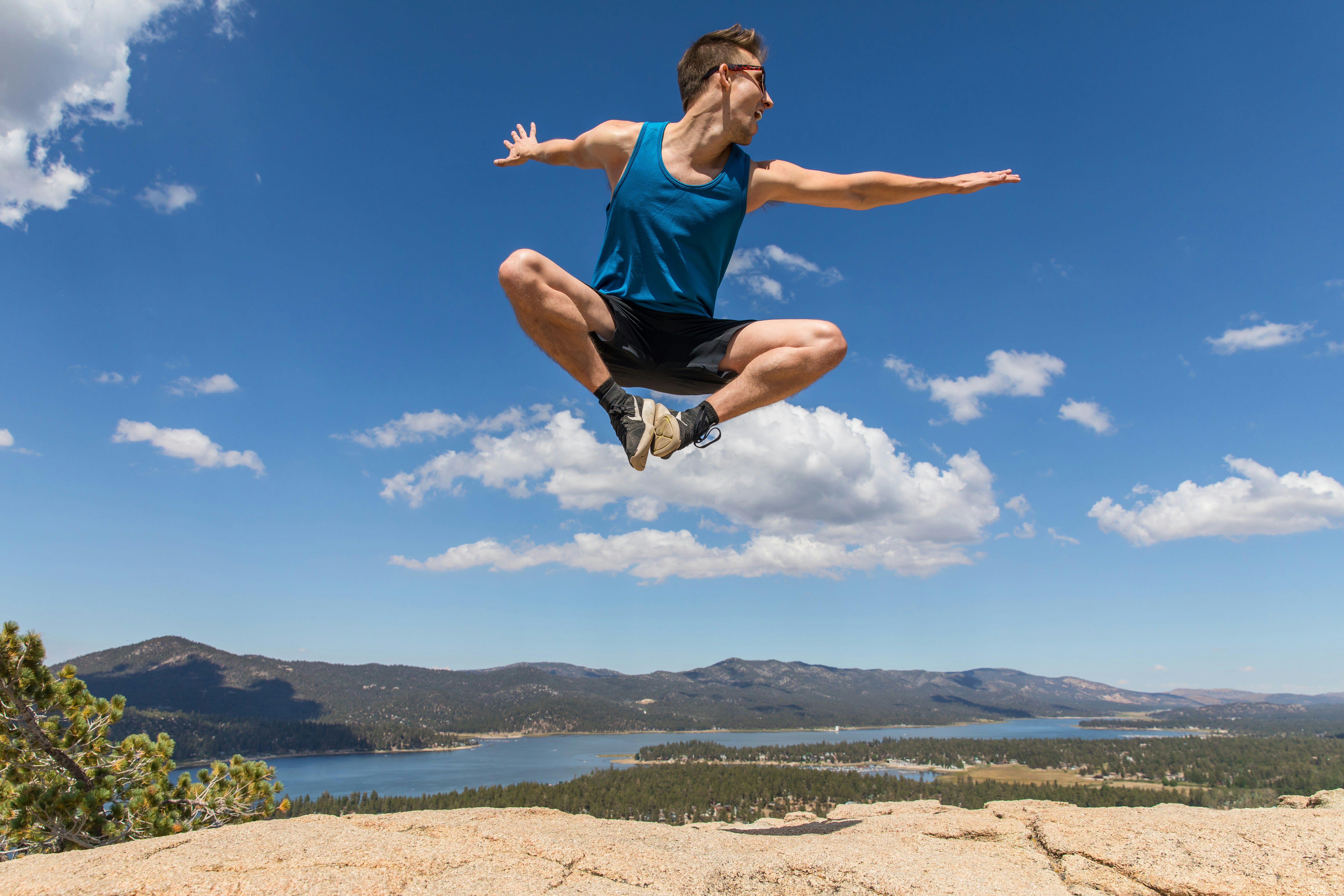 Celebrating success after a long hike up the mountain. Ambition to get outside, see your goal and achieve it. Motivational people like this set the bar high. Photographers 📸 @breeandstephenphoto. Model 👨🏼💻 @austindistel. ❤️ If you use this photo on your site, I would be very appreciative if you would please credit in the caption or meta to \