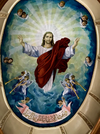 A serene painting of Jesus Christ with a glowing halo, radiating warmth and compassion.