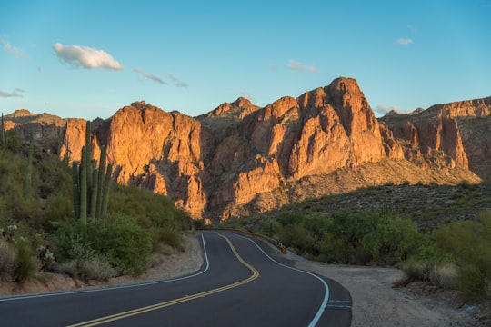 black asphalt road near mountain in Mountain United States