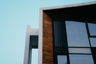 a tall building with a clock on the side of it