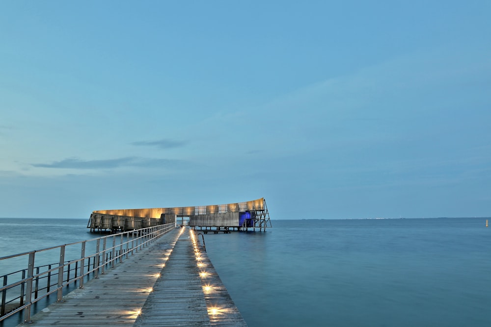 beach dock on beach under blue sky