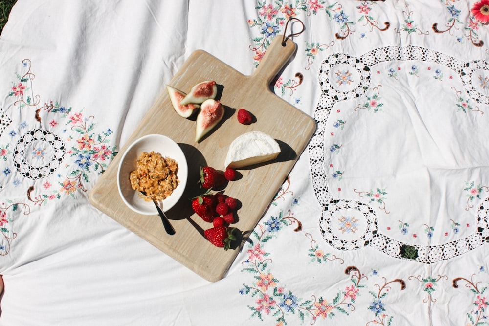 slice fruits on wooden chop board