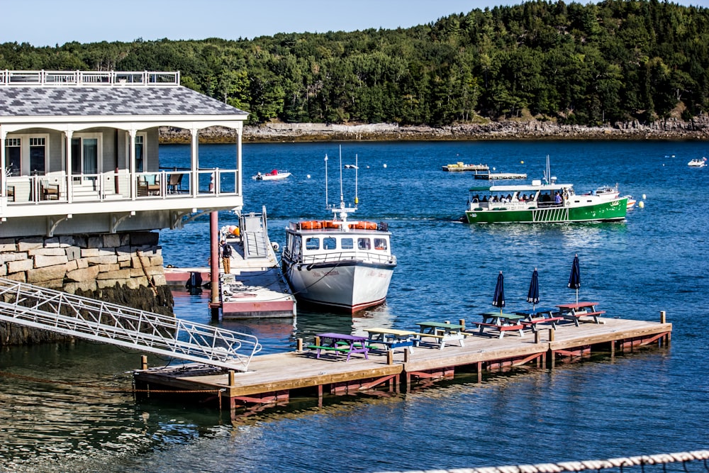 boats parked on dock during daytime