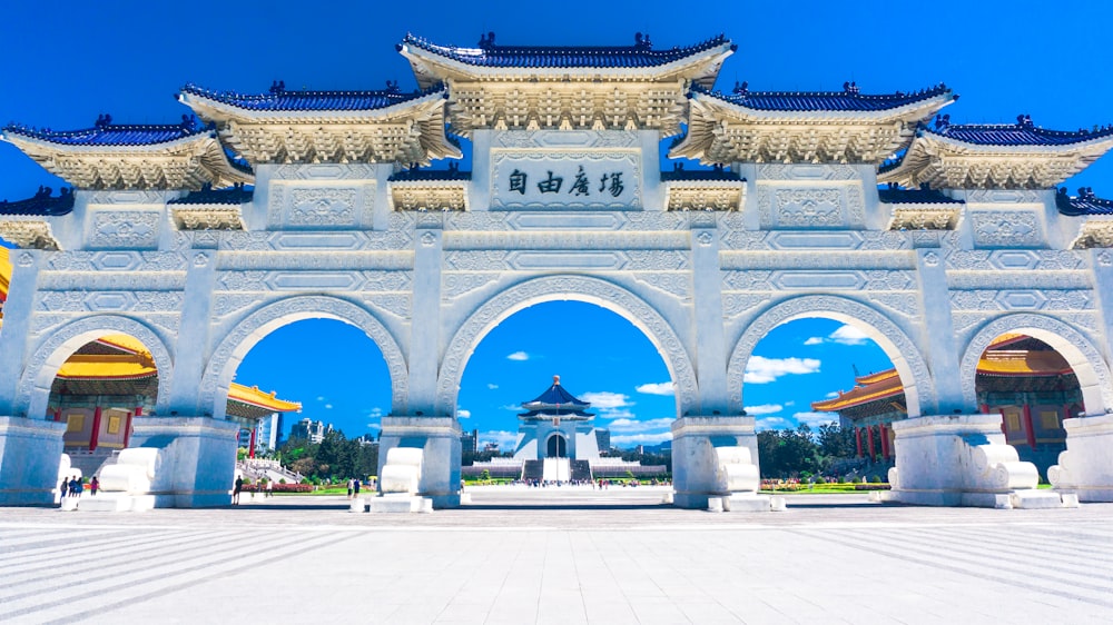 gray concrete arch under sunny sky