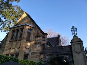 A cozy Lafayette home with a shield symbol softly glowing, representing protection from pests.