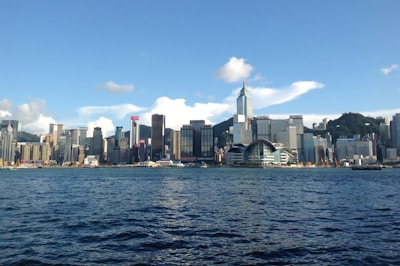 A panoramic view of a bustling city skyline with modern skyscrapers.