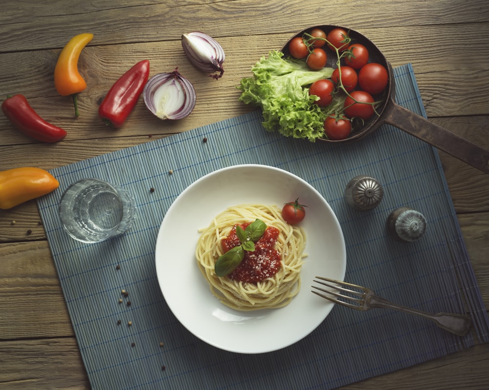 spaghetti on white ceramic plate