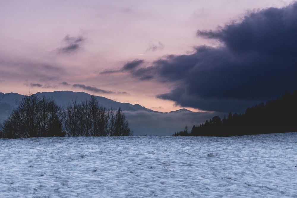 landscape photography of body of water with mountains