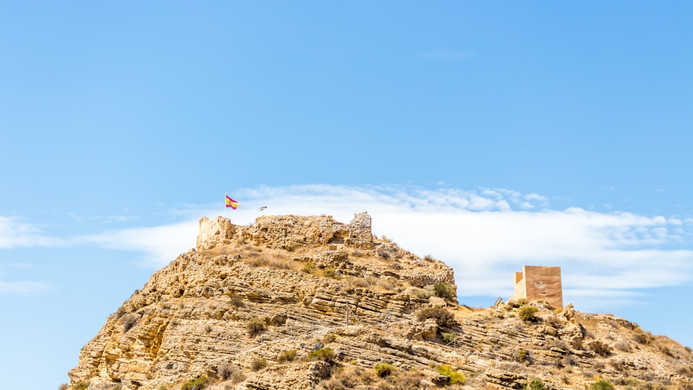 brown mountain under blue sky during daytime