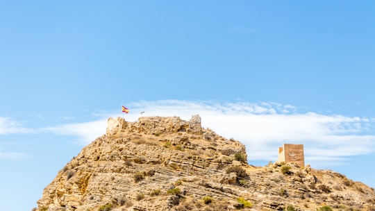 brown mountain under blue sky during daytime in Busot Spain