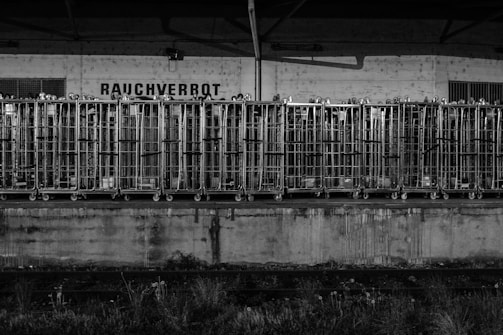 Stacked filter cages ready for shipment in a warehouse.