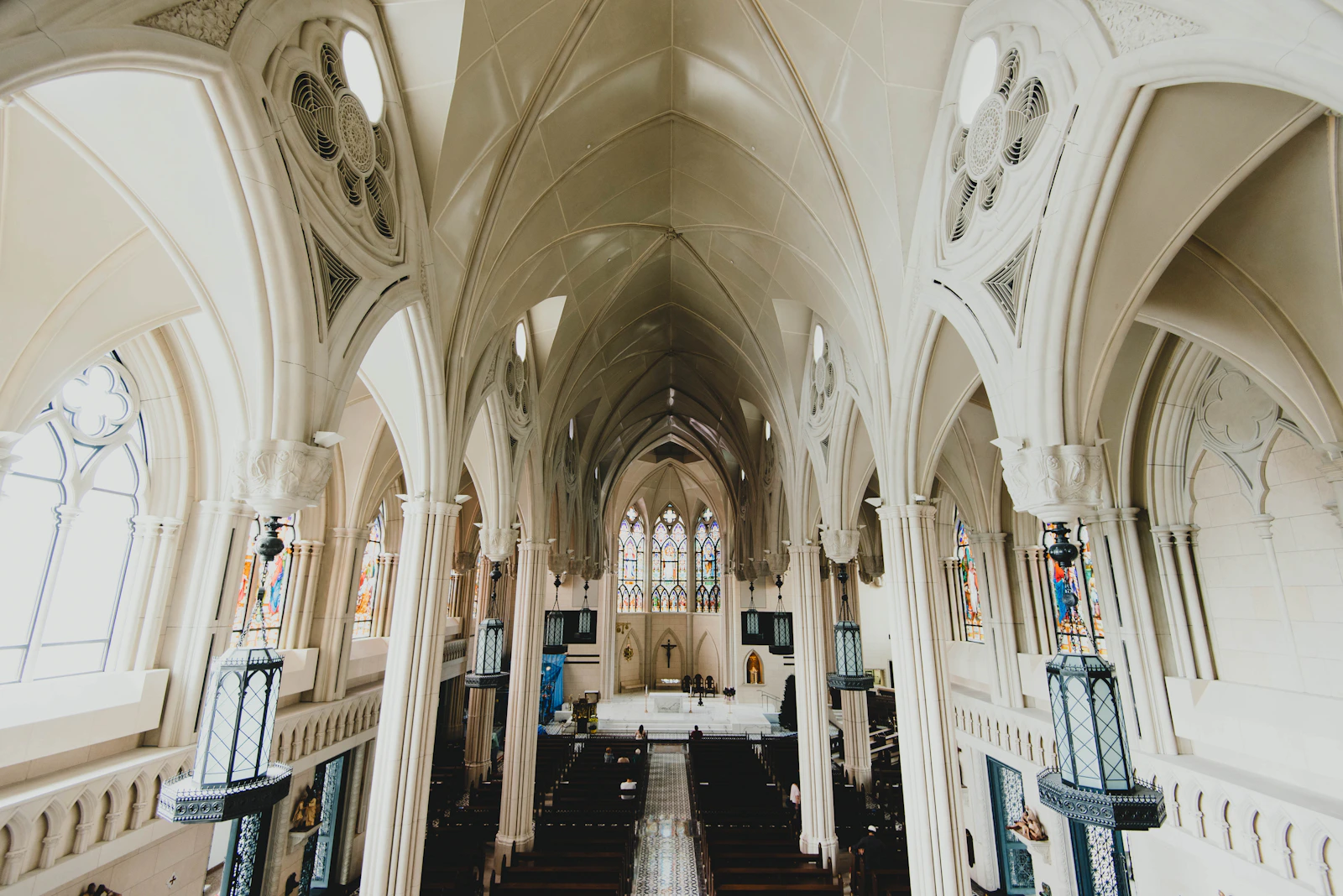 Bright church interior with rows of pews