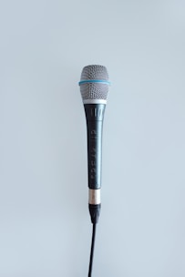 black and gray corded microphone