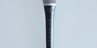 black and gray corded microphone