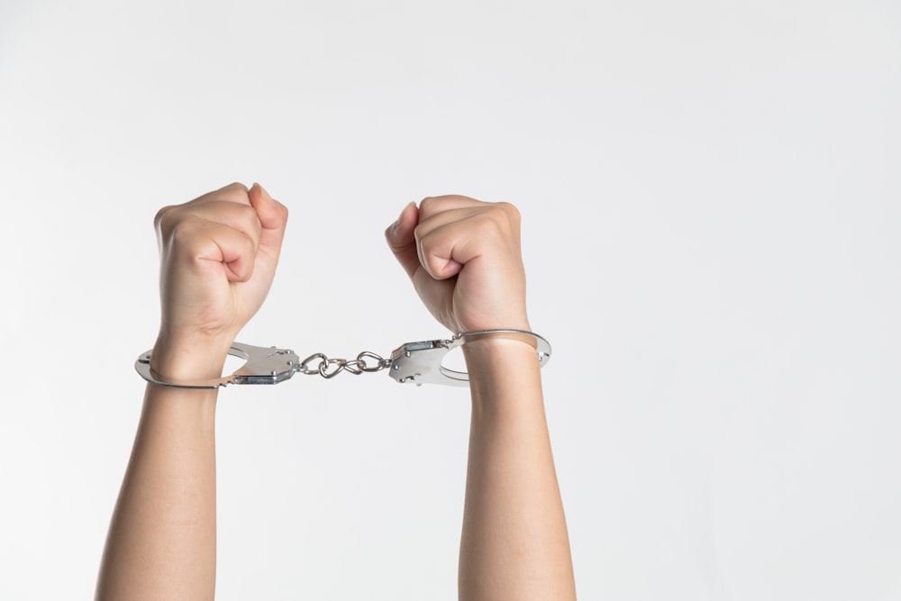 person showing handcuff